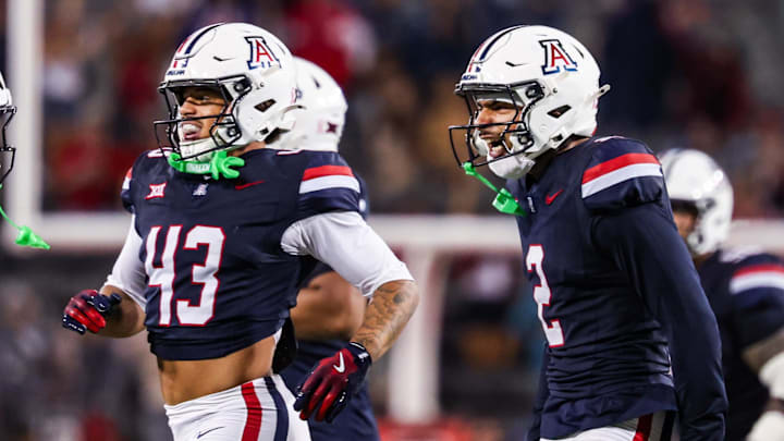 Oct 11, 2025; Tucson, Arizona, USA; Arizona Wildcats defensive back Treydan Stokes (2) celebrates an interception he made during the second quarter against the Brigham Young Cougars at Arizona Stadium. Mandatory Credit: Aryanna Frank-Imagn Images Oct 11, 2025; Tucson, Arizona, USA; Arizona Wildcats defensive back Treydan Stokes (2) celebrates an interception he made during the second quarter against the Brigham Young Cougars at Arizona Stadium. Mandatory Credit: Aryanna Frank-Imagn Images
