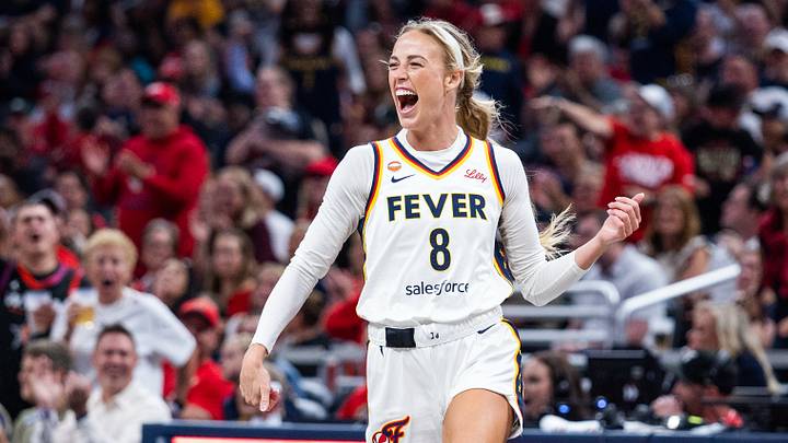 Indiana Fever guard Sophie Cunningham (8) celebrates a blocked shot in the second half against the New York Liberty at Gainbridge Fieldhouse.