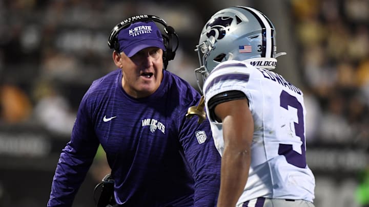Oct 12, 2024; Boulder, Colorado, USA; Kansas State Wildcats running back Dylan Edwards (3) celebrates with head coach Chris Klieman after a touchdown during the first half against the Colorado Buffaloes at Folsom Field. Mandatory Credit: Christopher Hanewinckel-Imagn Images