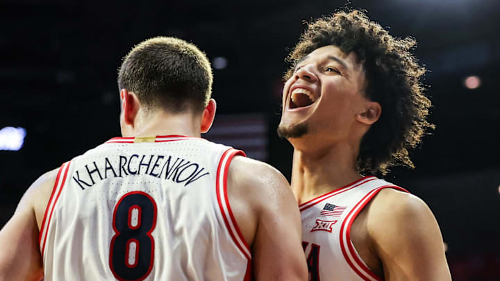 Dec 29, 2025; Tucson, Arizona, USA; Arizona Wildcats forward Ivan Kharchenkov (8) celebrates with guard Brayden Burries (5) during the second half of the game against the South Dakota State Jackrabbits at McKale Memorial Center. Mandatory Credit: Aryanna Frank-Imagn Images