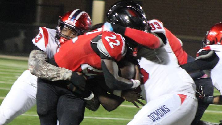Lugoff-Elgin teams up for the tackle on Westwood running back Jovan Howard. Lugoff-Elgin teams up for the tackle on Westwood running back Jovan Howard.