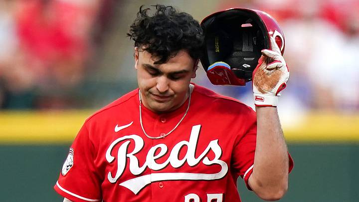 Cincinnati Reds first baseman Sal Stewart (27) walks off after being tagged out