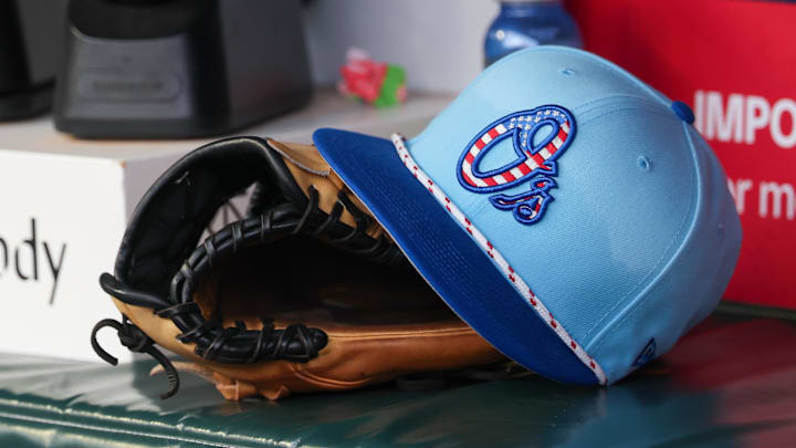 Jul 4, 2025; Atlanta, Georgia, USA; A detailed view of the Baltimore Orioles 4th of July hat in the dugout against the Atlanta Braves in the third inning at Truist Park. 