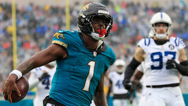 Jacksonville Jaguars running back Travis Etienne Jr. (1) scores a rushing touchdown during the second quarter of an NFL football game at EverBank Stadium, Sunday, Dec. 7, 2025, in Jacksonville, Fla. [Corey Perrine/Florida Times-Union]