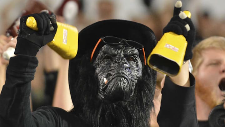 A Mississippi State fan dressed as a gorilla rings a cowbell during the third quarter of the game against the Kentucky Wildcats at Davis Wade Stadium. Mississippi State won 42-16. A Mississippi State fan dressed as a gorilla rings a cowbell during the third quarter of the game against the Kentucky Wildcats at Davis Wade Stadium. Mississippi State won 42-16.