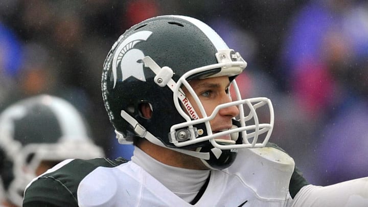 Nov 26, 2011; Evanston, IL, USA; Michigan State Spartans quarterback Kirk Cousins (8) calls a play against the Northwestern Wildcats during the second half at Ryan Field. Michigan State defeats Northwestern 31-17.