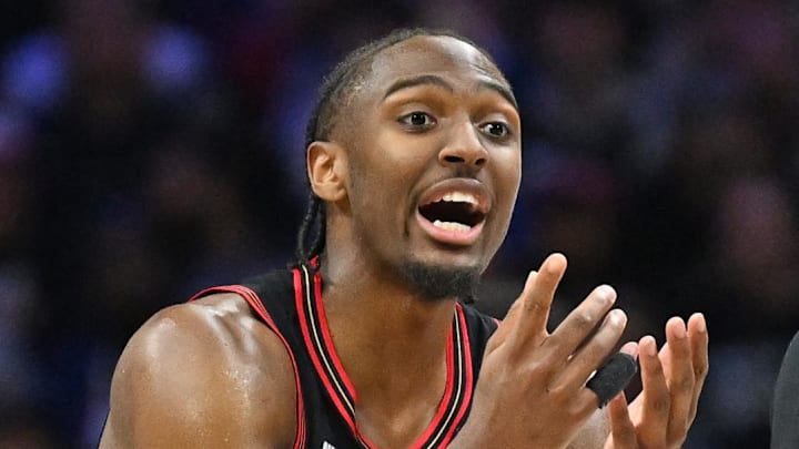 Apr 26, 2026; Philadelphia, Pennsylvania, USA; Philadelphia 76ers guard Tyrese Maxey (0) speaks with referee Josh Tiven (58) against the Boston Celtics during the second half at Xfinity Mobile Arena. Mandatory Credit: Eric Hartline-Imagn Images