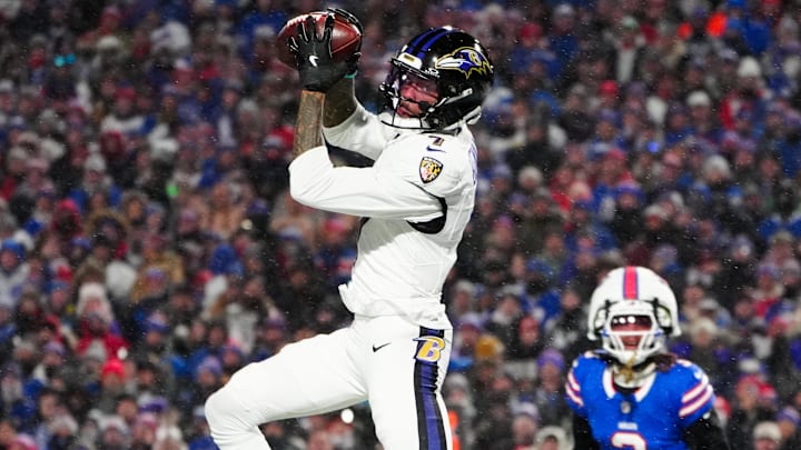 Jan 19, 2025; Orchard Park, New York, USA; Baltimore Ravens wide receiver Rashod Bateman (7) makes a catch for a touchdown during the first quarter against the Buffalo Bills in a 2025 AFC divisional round game at Highmark Stadium. Mandatory Credit: Gregory Fisher-Imagn Images