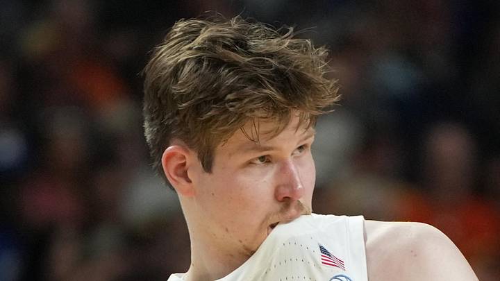 Mar 19, 2026; Greenville, SC, USA; North Carolina Tar Heels center Henri Veesaar (13) bites his jersey against the VCU Rams in the second half of a first round game of the men's 2026 NCAA Tournament at Bon Secours Wellness Arena. Mandatory Credit: Bob Donnan-Imagn Images