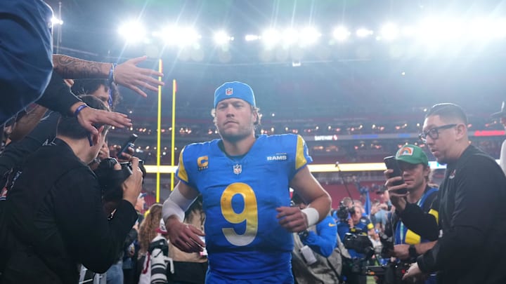 Jan 13, 2025; Glendale, AZ, USA; Los Angeles Rams quarterback Matthew Stafford (9) reacts after the NFC wild card game against the Minnesota Vikings at State Farm Stadium. Mandatory Credit: Joe Camporeale-Imagn Images