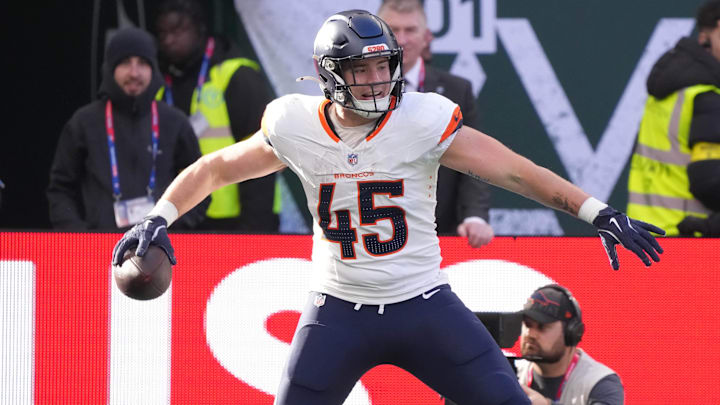 Oct 12, 2025; Tottenham, United Kingdom; Denver Broncos tight end Nate Adkins (45) celebrates a touchdown against the New York Jets during an NFL International Series game at Tottenham Hotspur Stadium. 