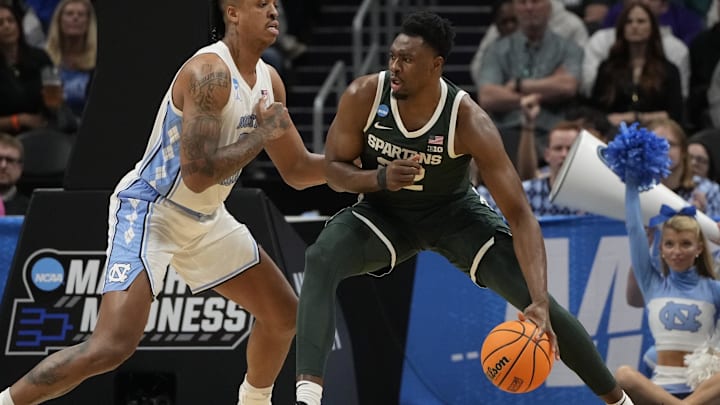 March 23, 2024, Charlotte, NC, USA; Michigan State Spartans center Mady Sissoko (22) is defended by North Carolina Tar Heels forward Armando Bacot (5) in the second round of the 2024 NCAA Tournament at the Spectrum Center. Mandatory Credit: Bob Donnan-Imagn Images March 23, 2024, Charlotte, NC, USA; Michigan State Spartans center Mady Sissoko (22) is defended by North Carolina Tar Heels forward Armando Bacot (5) in the second round of the 2024 NCAA Tournament at the Spectrum Center. Mandatory Credit: Bob Donnan-Imagn Images