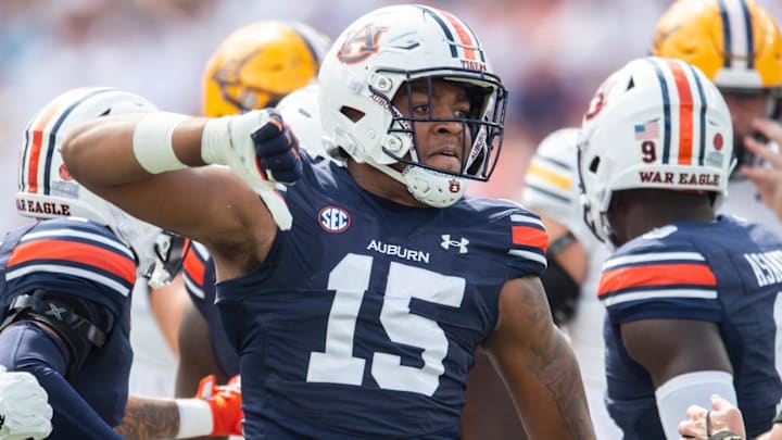 Auburn Tigers defensive lineman Keldric Faulk (15) celebrates a stop as Auburn Tigers take on California Golden Bears 
