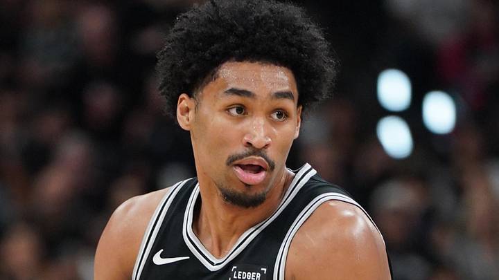 May 28, 2026; San Antonio, Texas, USA; San Antonio Spurs guard Dylan Harper (2) dribbles the ball past Oklahoma City Thunder guard Cason Wallace (22) in the first half during game six of the western conference finals for the 2026 NBA playoffs at Frost Bank Center. Mandatory Credit: Dustin Safranek-Imagn Images
