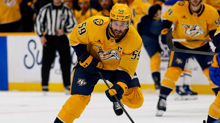 Jan 20, 2026; Nashville, Tennessee, USA;  Nashville Predators defenseman Roman Josi (59) skates with the puck against the Buffalo Sabres during the third period at Bridgestone Arena. Mandatory Credit: Steve Roberts-Imagn Images