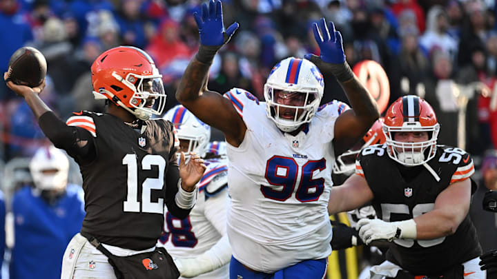 Buffalo Bills defensive tackle Deone Walker (96)v applies pressure on Cleveland Browns quarterback Shedeur Sanders (12) during the second half at Huntington Bank Field.