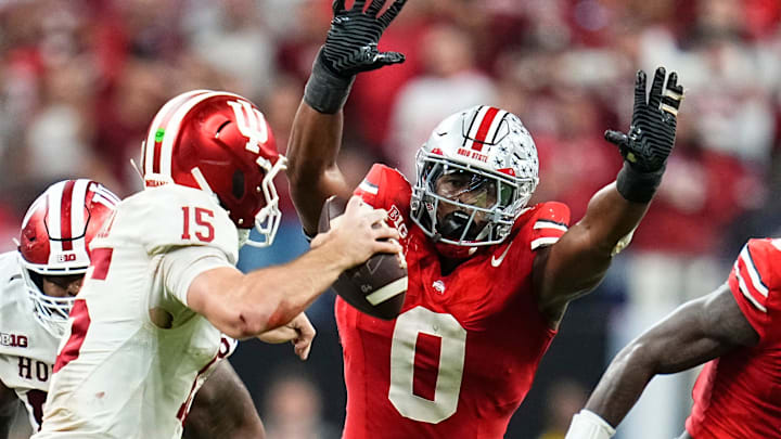 Ohio State Buckeyes linebacker Sonny Styles (0) pressures Indiana Hoosiers quarterback Fernando Mendoza (15) during the Big Ten Conference championship game at Lucas Oil Stadium in Indianapolis on Dec. 6, 2025. Ohio State lost 13-10. Ohio State Buckeyes linebacker Sonny Styles (0) pressures Indiana Hoosiers quarterback Fernando Mendoza (15) during the Big Ten Conference championship game at Lucas Oil Stadium in Indianapolis on Dec. 6, 2025. Ohio State lost 13-10.