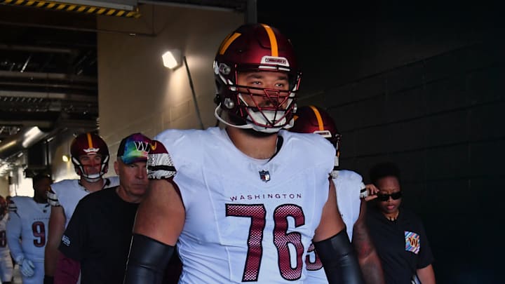 Oct 1, 2023; Philadelphia, Pennsylvania, USA; Washington Commanders offensive tackle Sam Cosmi (76) leads his team in the tunnel against the Philadelphia Eagles at Lincoln Financial Field. Mandatory Credit: Eric Hartline-USA TODAY Sports