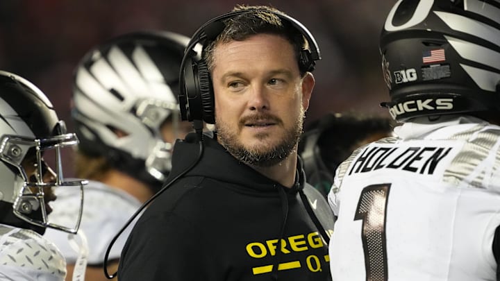Nov 16, 2024; Madison, Wisconsin, USA;  Oregon Ducks head coach Dan Lanning looks on during the third quarter against the Wisconsin Badgers at Camp Randall Stadium. Mandatory Credit: Jeff Hanisch-Imagn Images