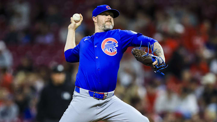 May 23, 2025; Cincinnati, Ohio, USA; Chicago Cubs relief pitcher Ryan Pressly (55) pitches against the Cincinnati Reds in the ninth inning at Great American Ball Park. 