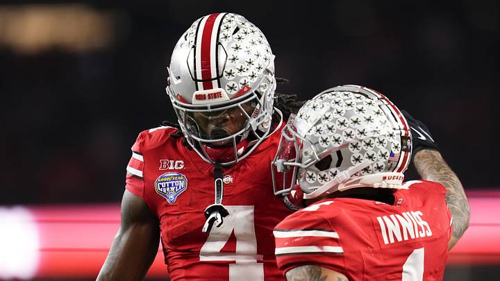 Ohio State Buckeyes wide receiver Brandon Inniss (1) celebrates a touchdown by wide receiver Jeremiah Smith (4) during the Cotton Bowl at AT&T Stadium in Arlington, Texas for the College Football Playoff quarterfinal game against the Miami Hurricanes on Dec. 31, 2025. Ohio State lost 24-14. Ohio State Buckeyes wide receiver Brandon Inniss (1) celebrates a touchdown by wide receiver Jeremiah Smith (4) during the Cotton Bowl at AT&T Stadium in Arlington, Texas for the College Football Playoff quarterfinal game against the Miami Hurricanes on Dec. 31, 2025. Ohio State lost 24-14.