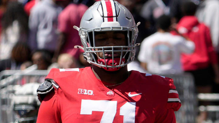 April 13, 2024; Columbus, Ohio, USA; 
Ohio State Buckeyes offensive tackle Josh Simmons (71) competes during the first half of the LifeSports spring football game at Ohio Stadium on Saturday.