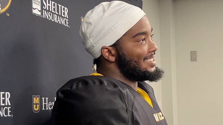 Missouri Tigers offensive lineman Curtis Peagler smiles while speaking to local media after practice on Tuesday, Aug. 11, 2025 in Columbia, Missouri, USA. 