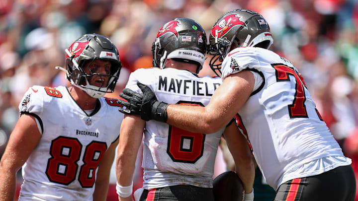 Sep 29, 2024; Tampa, Florida, USA; Tampa Bay Buccaneers tight end Cade Otton (88) congratulates quarterback Baker Mayfield (6) after a touchdown against the Philadelphia Eagles in the second quarter at Raymond James Stadium. Mandatory Credit: Nathan Ray Seebeck-Imagn Images Sep 29, 2024; Tampa, Florida, USA; Tampa Bay Buccaneers tight end Cade Otton (88) congratulates quarterback Baker Mayfield (6) after a touchdown against the Philadelphia Eagles in the second quarter at Raymond James Stadium. Mandatory Credit: Nathan Ray Seebeck-Imagn Images
