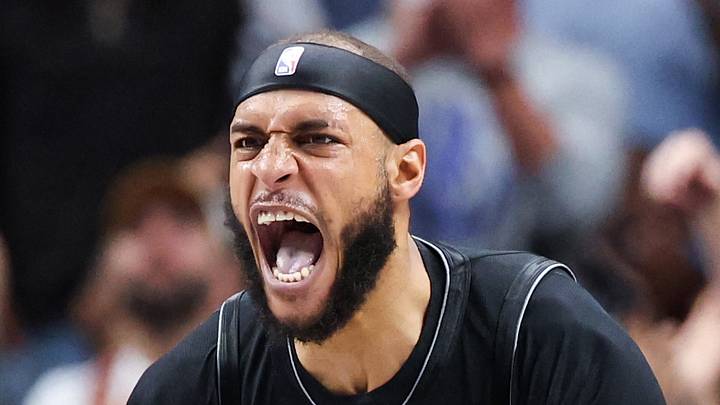 Nov 16, 2025; Dallas, Texas, USA;  Dallas Mavericks forward Daniel Gafford (21) reacts against the Portland Trail Blazers in overtime at American Airlines Center. Mandatory Credit: Kevin Jairaj-Imagn Images