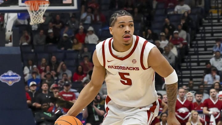 Mar 13, 2026; Nashville, TN, USA;  Arkansas Razorbacks guard Darius Acuff Jr. (5) drives to the basket against the Oklahoma Sooners during the first half at Bridgestone Arena. 