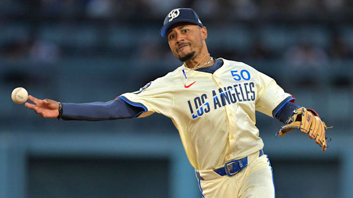 Los Angeles Dodgers shortstop Mookie Betts (50) makes an out during the fifth inning against the Arizona Diamondbacks at Dodger Stadium on Aug. 30.