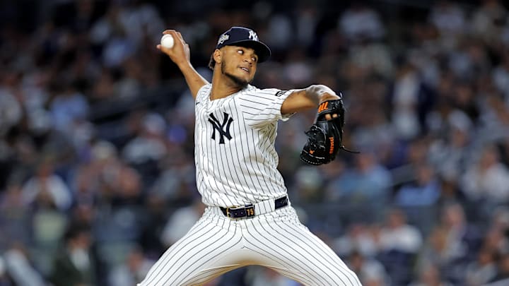 Oct 8, 2025; Bronx, New York, USA; New York Yankees pitcher Camilo Doval (75) pitches during the eighth inning against the Toronto Blue Jays during game four of the ALDS round for the 2025 MLB playoffs at Yankee Stadium. Mandatory Credit: Brad Penner-Imagn Images
