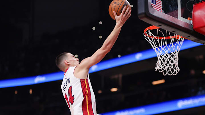 Feb 20, 2026; Atlanta, Georgia, USA; Miami Heat guard Tyler Herro (14) shoots against the Atlanta Hawks in the first quarter at State Farm Arena. Mandatory Credit: Brett Davis-Imagn Images