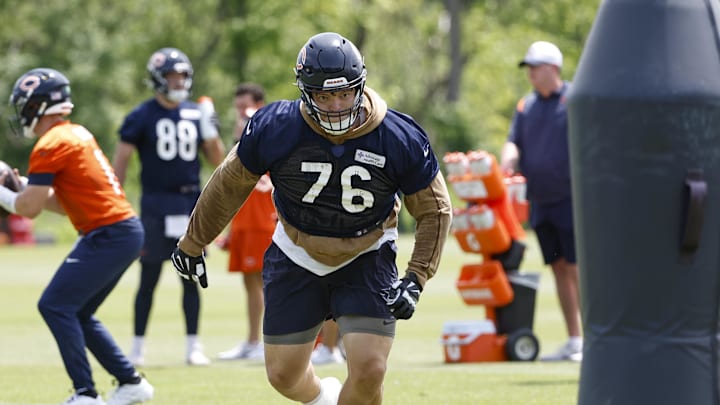 May 31, 2024; Lake Forest, IL, USA; Chicago Bears offensive tackle Teven Jenkins (76) runs during organized team activities at Halas Hall. Mandatory Credit: Kamil Krzaczynski-Imagn Images