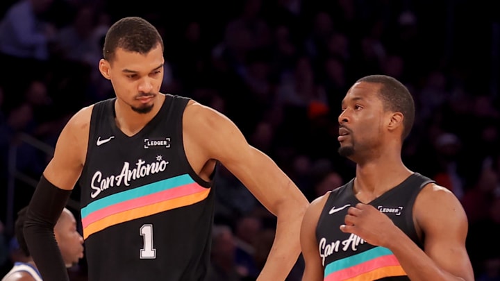 Mar 1, 2026; New York, New York, USA; San Antonio Spurs forwards Victor Wembanyama (1) and Harrison Barnes (40) react during the second quarter against the New York Knicks at Madison Square Garden. Mandatory Credit: Brad Penner-Imagn Images