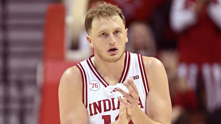 Indiana Hoosiers forward Tucker Devries (12) celebrates against the Milwaukee Panthers at Simon Skjodt Assembly Hall. 