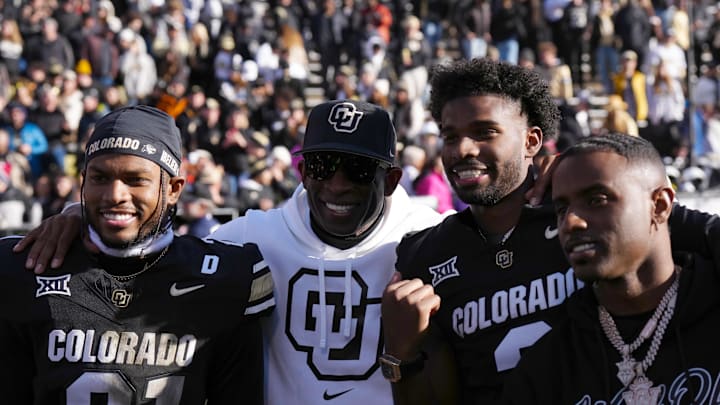 Nov 29, 2024; Boulder, Colorado, USA; Colorado Buffaloes safety Shilo Sanders (21) and head coach Deion Sanders and quarterback Shedeur Sanders (2) and social media producer Deion Sanders Jr. following the win against the Oklahoma State Cowboys at Folsom Field. Nov 29, 2024; Boulder, Colorado, USA; Colorado Buffaloes safety Shilo Sanders (21) and head coach Deion Sanders and quarterback Shedeur Sanders (2) and social media producer Deion Sanders Jr. following the win against the Oklahoma State Cowboys at Folsom Field.