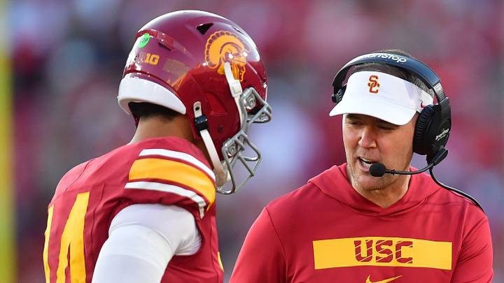 Nov 16, 2024; Los Angeles, California, USA; Southern California Trojans head coach Lincoln Riley greets quarterback Jayden Maiava (14) after scoring a touchdown against the Nebraska Cornhuskers during the second half at the Los Angeles Memorial Coliseum. Mandatory Credit: Gary A. Vasquez-Imagn Images Nov 16, 2024; Los Angeles, California, USA; Southern California Trojans head coach Lincoln Riley greets quarterback Jayden Maiava (14) after scoring a touchdown against the Nebraska Cornhuskers during the second half at the Los Angeles Memorial Coliseum. Mandatory Credit: Gary A. Vasquez-Imagn Images