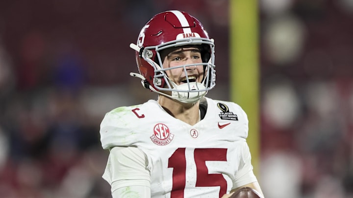 Dec 19, 2025; Norman, OK, USA; Alabama Crimson Tide quarterback Ty Simpson (15) celebrates a win after a game against the  Oklahoma Sooners at Gaylord Family OK Memorial Stadium. Mandatory Credit: Nelson Chenault-Imagn Images