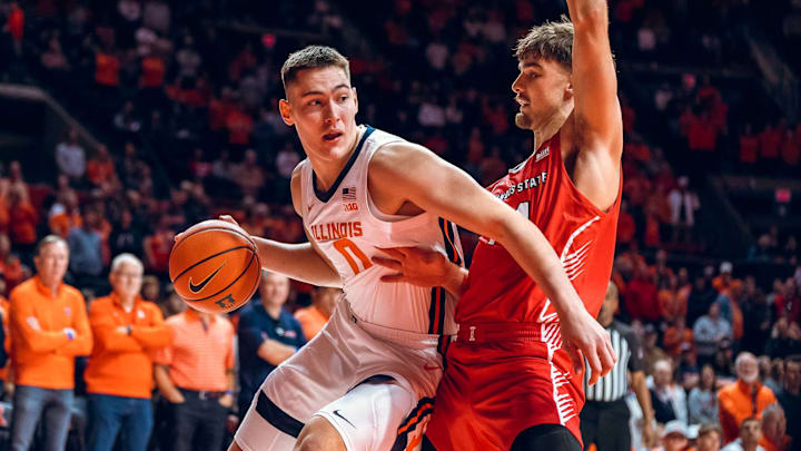 Illinois forward David Mirkovic posts up an Illinois State defender in the Illini's 92-65 exhibition win Oct. 19 at the State Farm Center in Champaign, Illinois.