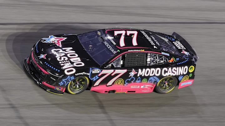 Aug 23, 2025; Daytona Beach, Florida, USA; NASCAR Cup Series driver Carson Hocevar (77) during the Coke Zero Sugar 400 at Daytona International Speedway.