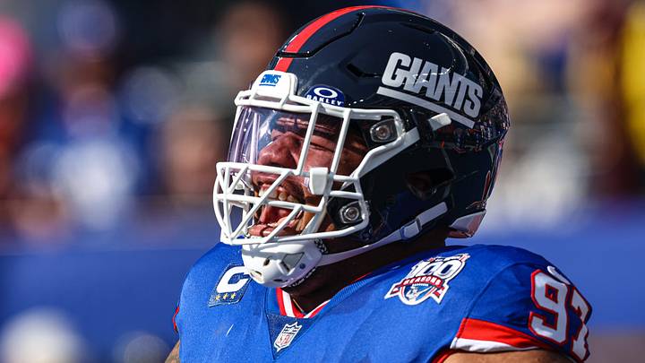 Nov 3, 2024; East Rutherford, New Jersey, USA; New York Giants defensive tackle Dexter Lawrence II (97) reacts during introductions before the game against the Washington Commanders at MetLife Stadium. Mandatory Credit: Vincent Carchietta-Imagn Images