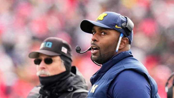 Nov 25, 2023; Ann Arbor, Michigan, USA; Michigan Wolverines interim head coach Sherrone Moore watches from the sideline during the first half of the NCAA football game against the Ohio State Buckeyes at Michigan Stadium. Mandatory Credit: Adam Cairns-USA TODAY Sports Nov 25, 2023; Ann Arbor, Michigan, USA; Michigan Wolverines interim head coach Sherrone Moore watches from the sideline during the first half of the NCAA football game against the Ohio State Buckeyes at Michigan Stadium. Mandatory Credit: Adam Cairns-USA TODAY Sports