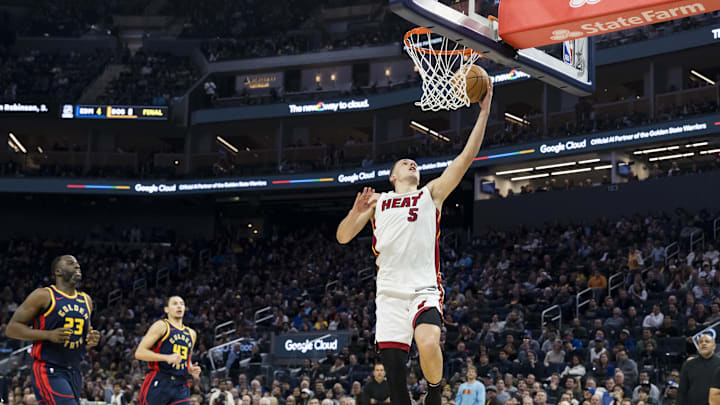 Jan 7, 2025; San Francisco, California, USA; Miami Heat forward Nikola Jovic (5) shoots a layup against the Golden State Warriors during the second quarter at Chase Center. Mandatory Credit: John Hefti-Imagn Images