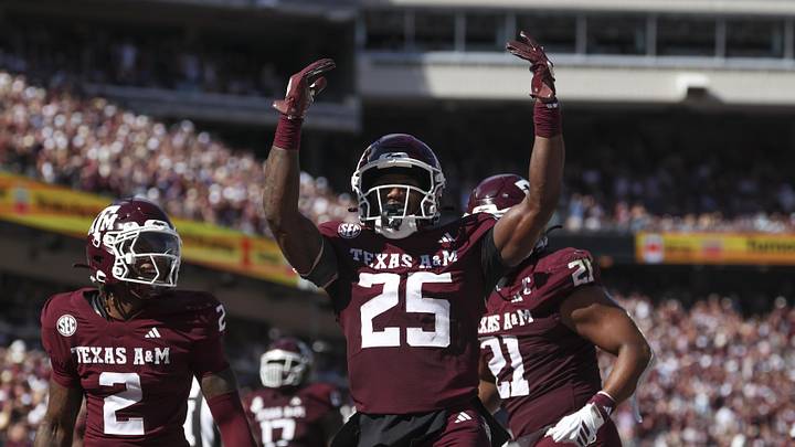Nov 15, 2025; College Station, Texas, USA; Texas A&M Aggies safety Dalton Brooks (25) reacts after an interception during the second quarter against the South Carolina Gamecocks at Kyle Field. Mandatory Credit: Troy Taormina-Imagn Images