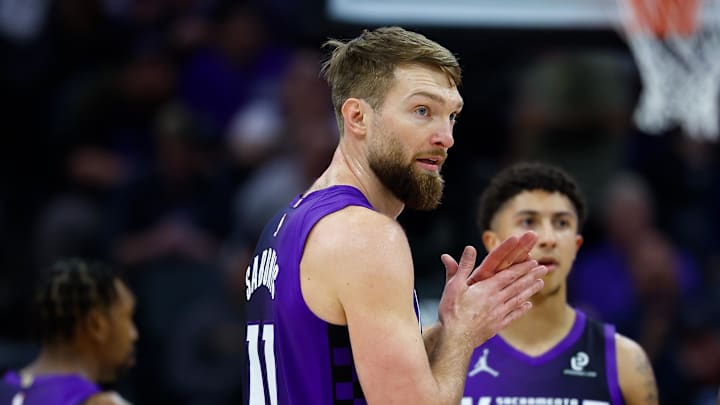 Jan 16, 2026; Sacramento, California, USA; Sacramento Kings forward Domantas Sabonis (11) talks with guard Dennis Schroder (17) during the second quarter against the Washington Wizards at Golden 1 Center.