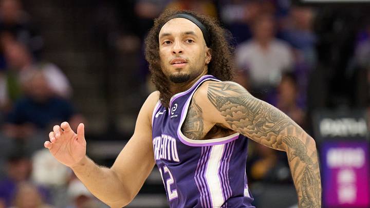 Apr 10, 2026; Sacramento, California, USA; Sacramento Kings guard Devin Carter (22) runs back on defense against the Golden State Warriors during the fourth quarter at Golden 1 Center. Mandatory Credit: Robert Edwards-Imagn Images