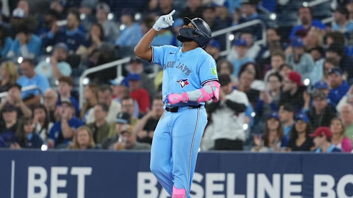 May 31, 2025; Toronto, Ontario, CAN; Toronto Blue Jays first baseman Vladimir Guerrero Jr. (27) celebrates hitting a single against the Athletics during the first inning at Rogers Centre. 