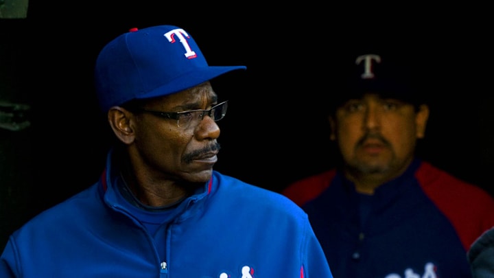 Texas Rangers manager Ron Washington (left) and pitcher Eddie Guardado (right) walk out from the player tunnel before the game against the Oakland Athletics at Oakland-Alameda County Coliseum on May 6, 2009.