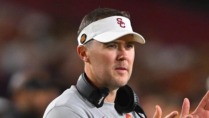Oct 1, 2022; Los Angeles, California, USA;  USC Trojans head coach Lincoln Riley applauds after a touchdown in the first half against the Arizona State Sun Devils at United Airlines Field at the Los Angeles Memorial Coliseum. Mandatory Credit: Jayne Kamin-Oncea-Imagn Images